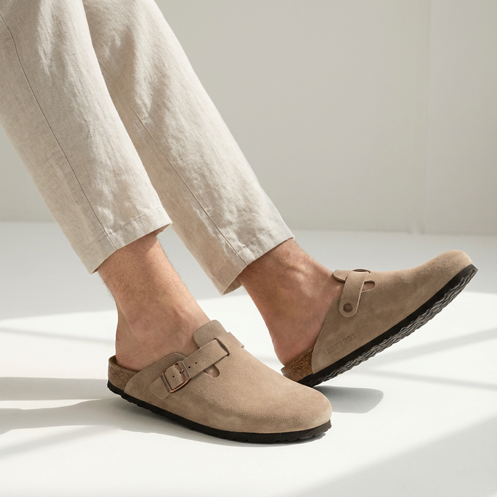 Men's casual slip-on clog mules with adjustable buckle strap, comfortable for everyday wear.