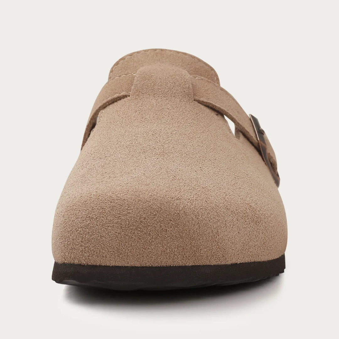 Men's casual clog mules featuring an adjustable buckle strap for a secure and comfortable fit.