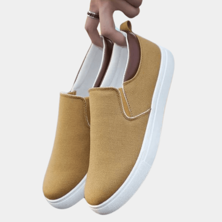 Breathable men's slip-on sneakers, perfect for summer & spring fashion. Lightweight casual footwear.