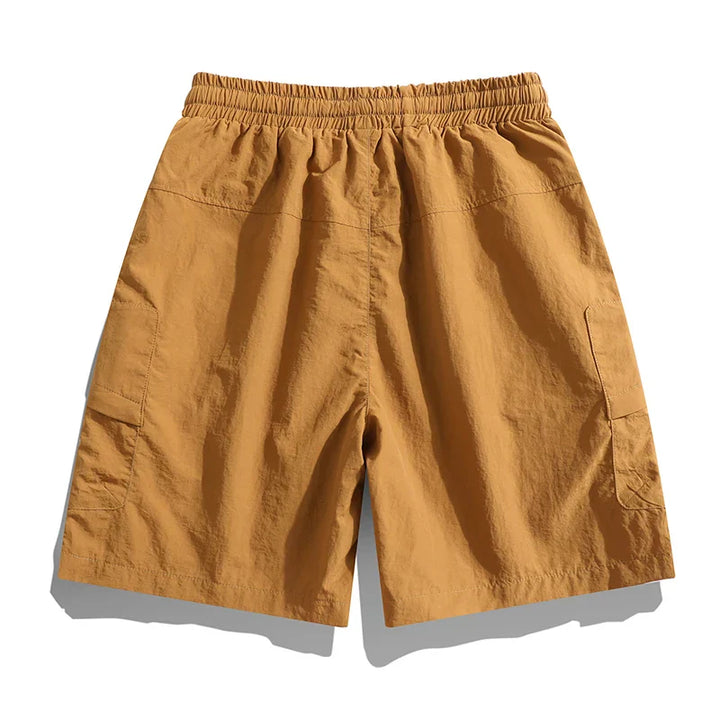 Comfortable men's summer cargo shorts with elastic waist, ideal for warm weather and casual wear.