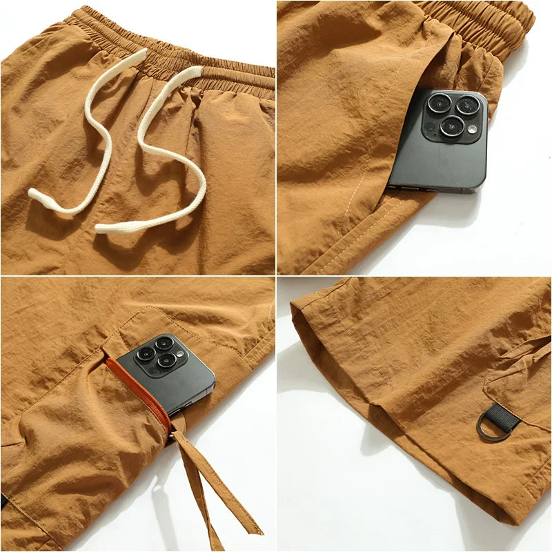 Relaxed fit men's cargo shorts with elastic waist, multiple utility pockets, perfect for summer casual wear.