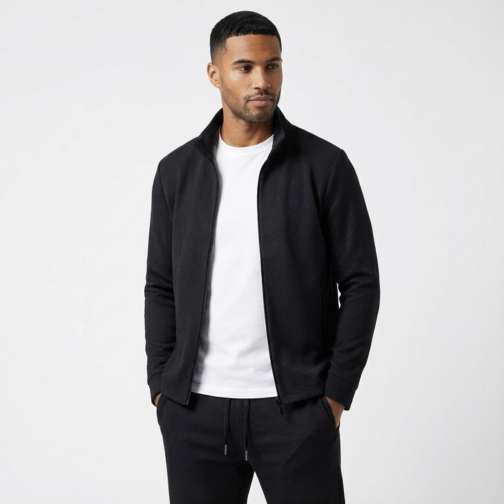 Men's casual tracksuit set with a zip jacket and matching joggers for comfortable athletic wear.
