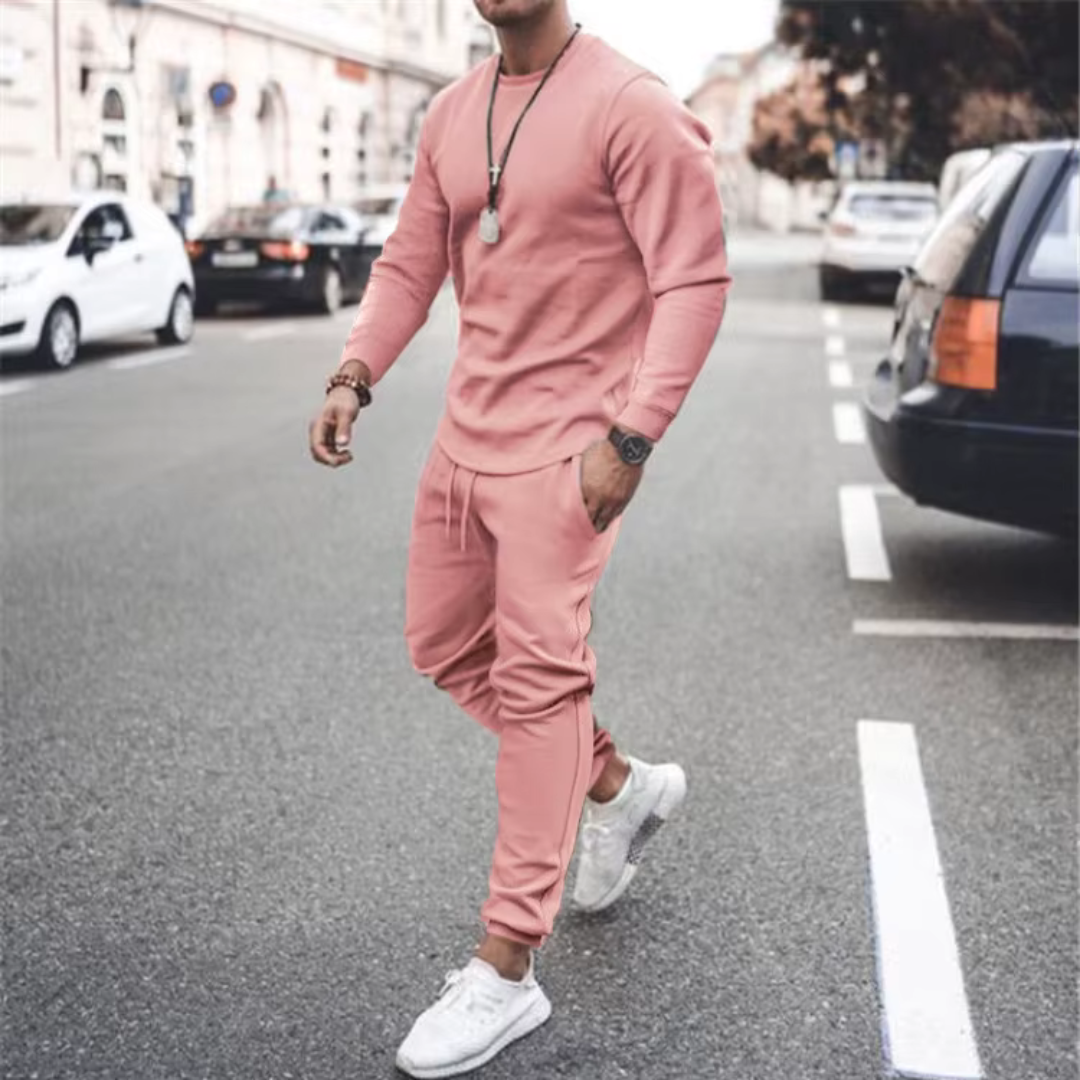 Men's casual two-piece cotton lounge set, featuring a loose-fit top and jogger pants with pockets.