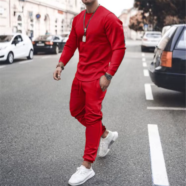 Loose-fit men's cotton top and jogger pants with pockets, a comfortable casual two-piece lounge wear set.
