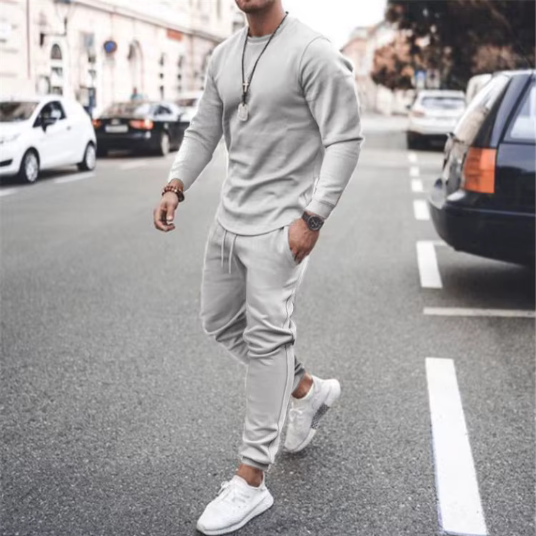 Modern men's fashion: a casual two-piece cotton lounge set featuring a comfortable loose fit and practical pockets.