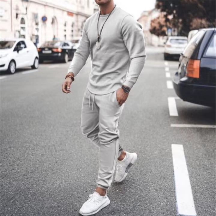 Modern men's fashion: a casual two-piece cotton lounge set featuring a comfortable loose fit and practical pockets.