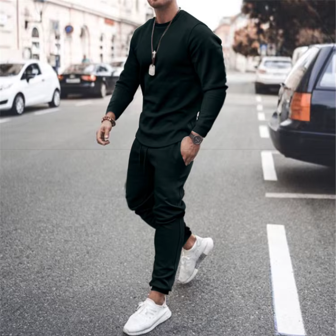 Men's casual jogger set: a two-piece cotton tracksuit with pockets, offering loose-fit style and comfort.