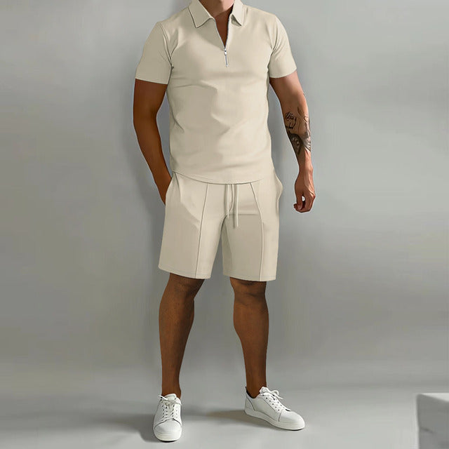 Men's casual two-piece polo shirt and shorts set with a stylish zip neck. Ideal for summer leisurewear and fashion.