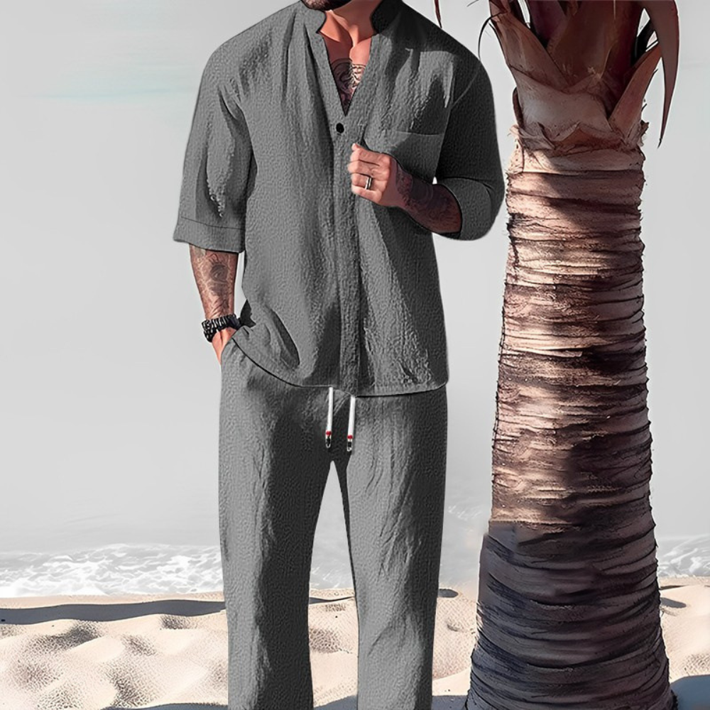 Relaxed fit men's two-piece shirt & trousers set, ideal for comfortable summer casual wear & holiday resort outfits.