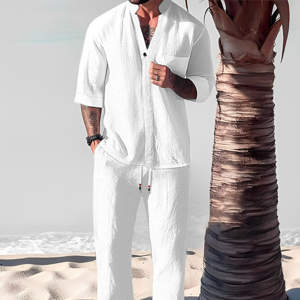 Modern men's two-piece outfit: stylish relaxed shirt & trousers for smart casual, loungewear, or versatile holiday fashion.