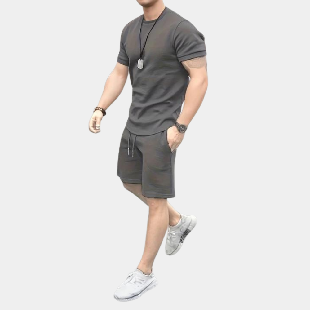 Men's relaxed fit summer two-piece with short-sleeve shirt & matching shorts. Great for casual wear or beach.