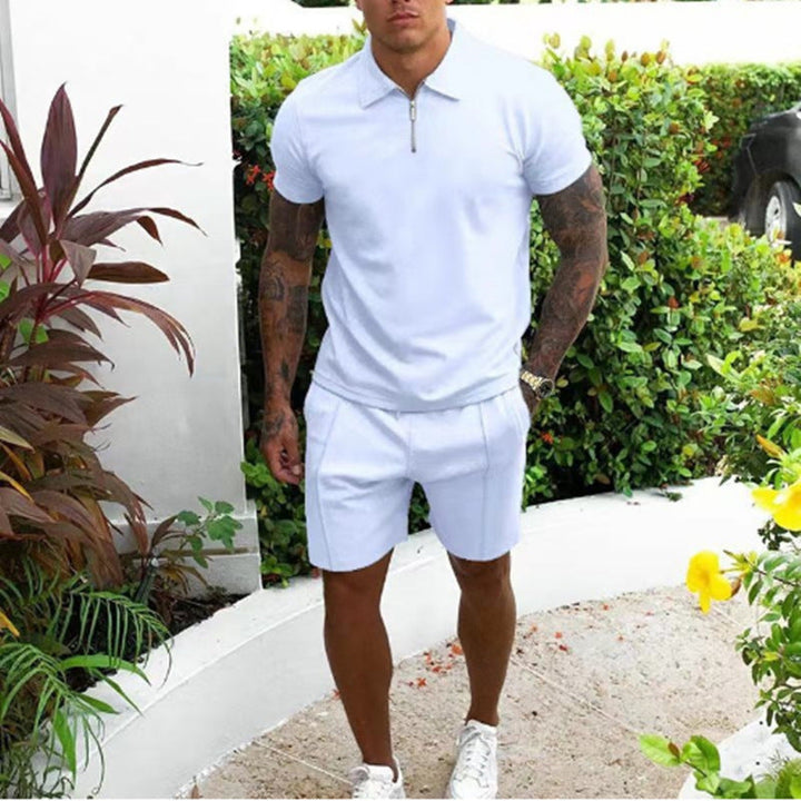 Stylish men's summer outfit: short sleeve zip polo shirt & matching shorts. Perfect for casual comfort.
