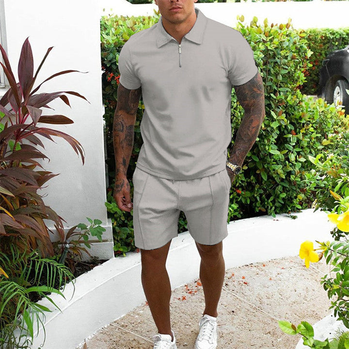 Versatile men's summer apparel: short sleeve zip polo and elastic waist shorts. Effortless holiday style.