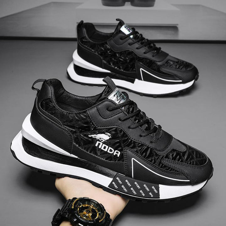 Stylish men's chunky sneakers with a unique quilted design and subtle color block accents.