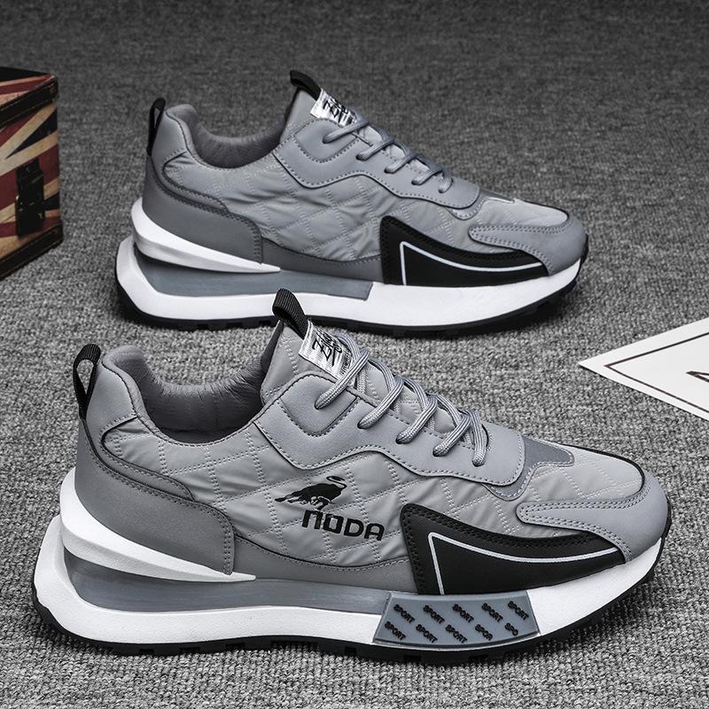 Contemporary men's chunky platform sneakers with a bold design, enhancing any casual men's fashion look.