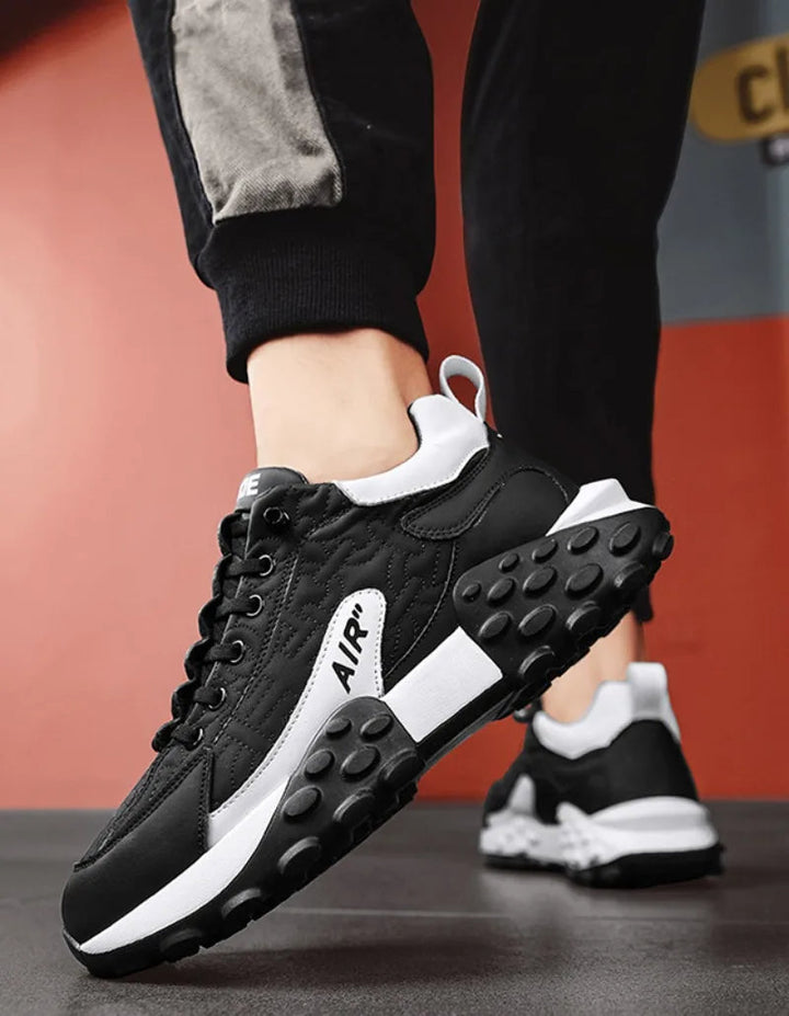 Men's chunky platform trainers in white, ideal for elevated street style & urban fashion. Comfortable & trendy sneakers.