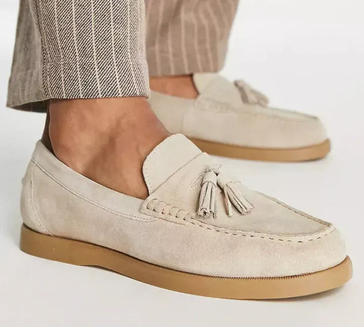 Men's classic beige suede loafers, versatile for formal or casual wear, comfortable slip-on design.