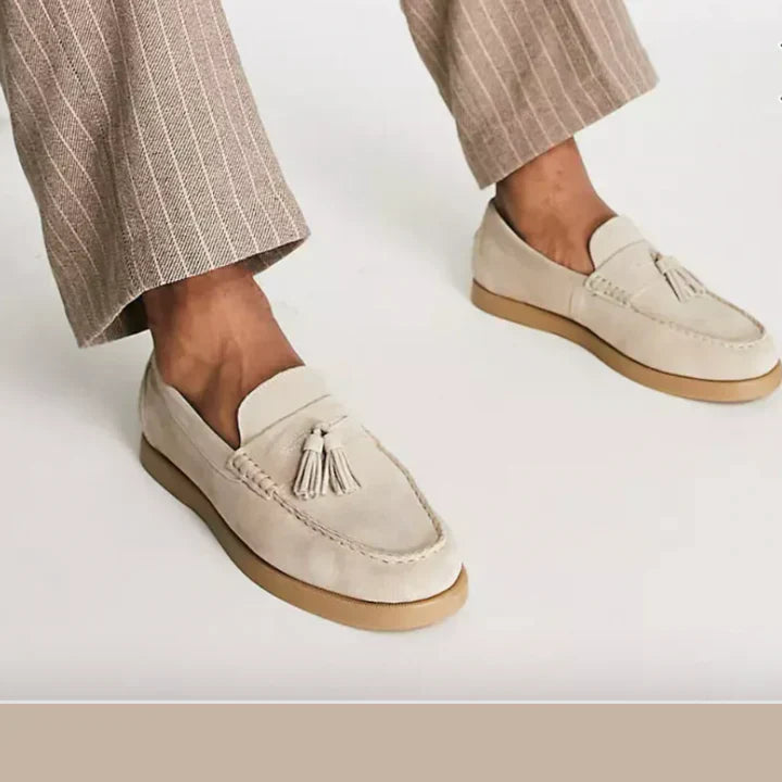 Classic men's beige suede loafers, ideal for men's fashion, offering comfort and timeless casual style.