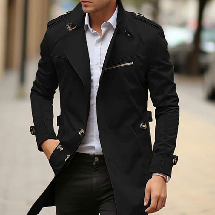 Versatile navy blue men's trench coat, ideal spring outerwear for a classic, tailored, and elegant long jacket.