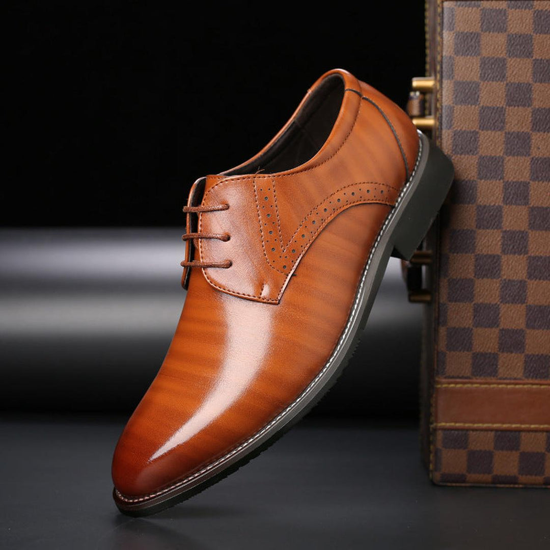 Classic men's formal dress shoes with comfortable design, suitable for business and special events.