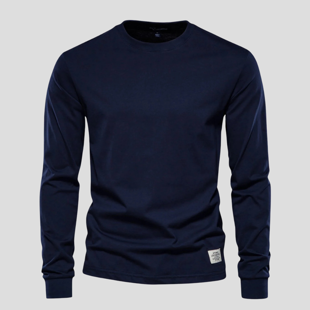 Men's forest green long-sleeved crew neck shirt. Classic, comfortable, and versatile for casual outfits.