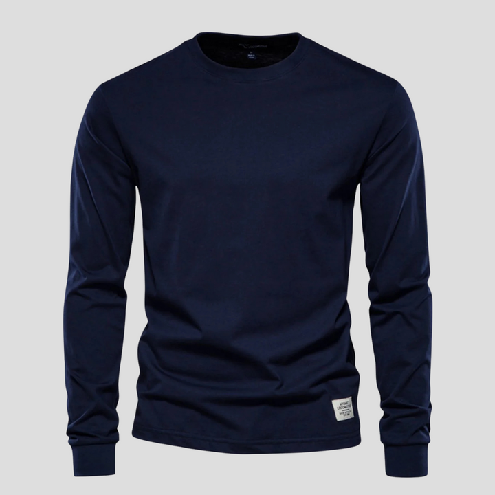 Men's forest green long-sleeved crew neck shirt. Classic, comfortable, and versatile for casual outfits.