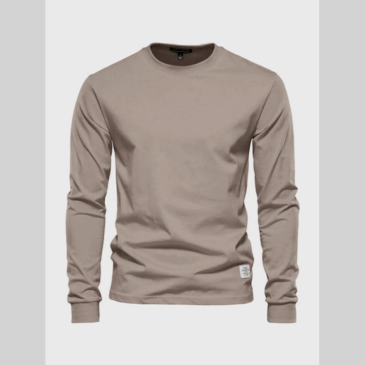Men's long-sleeve round-neck shirt. Versatile, relaxed fit for active everyday comfort and style.
