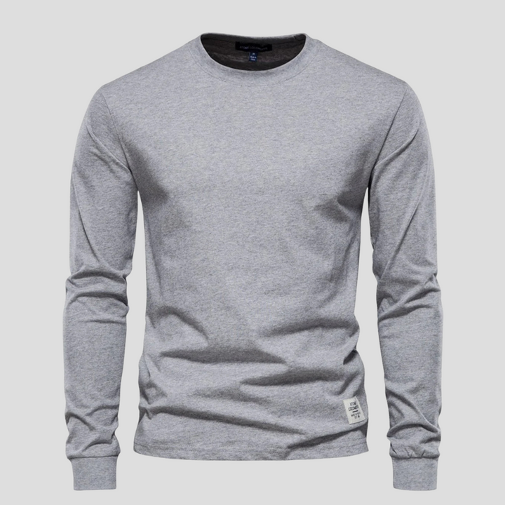 Everyday men's long-sleeved crew neck shirt in a classic hue. Soft and comfortable casual wear.