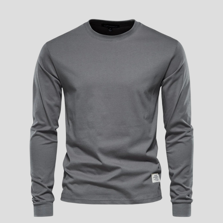 Simple men's long-sleeve round-neck shirt. Modern basic design for comfortable daily styling.