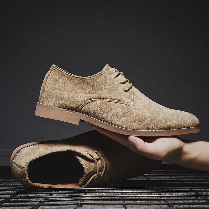 Men's classic black Oxford shoes, ideal for business, formal events, and professional office attire.