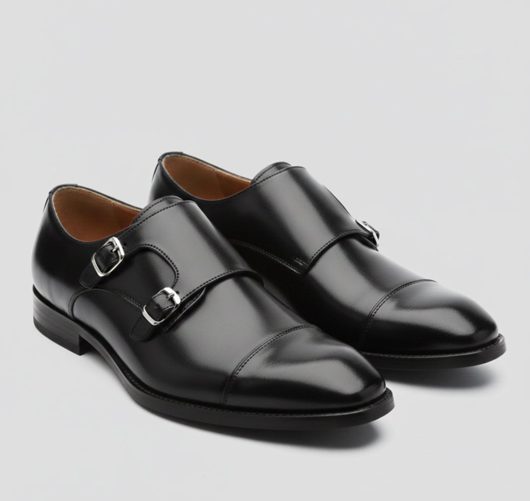 Men's classic black slip-on loafers, perfect for formal events & refined style.