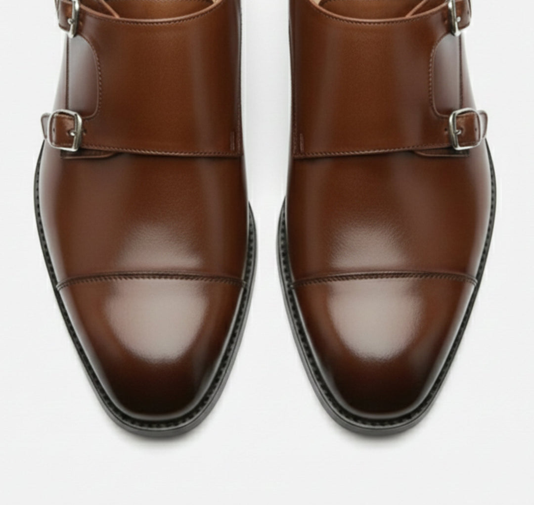Sleek black men's dress loafers, enhancing any formal or semi-formal ensemble with ease.