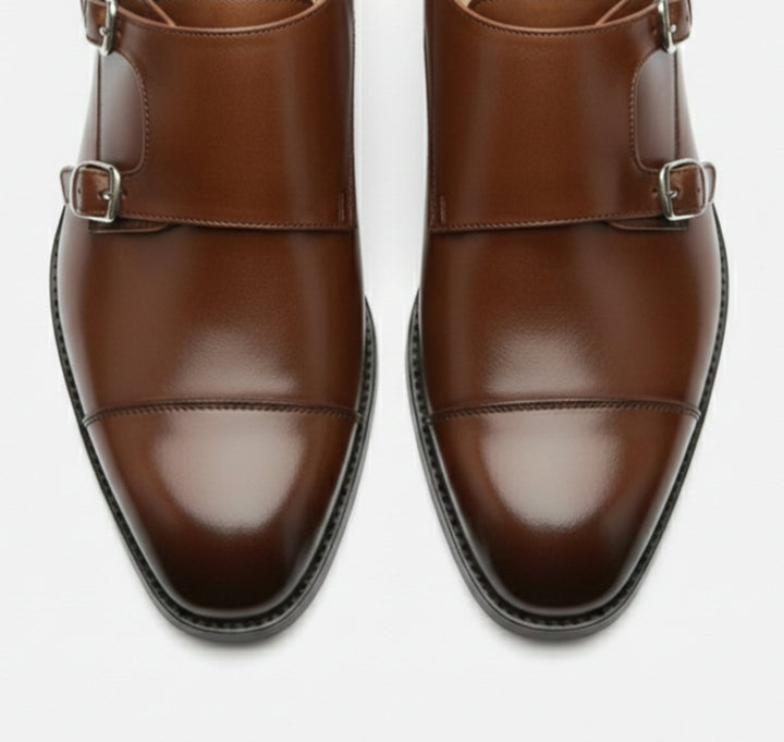 Sleek black men's dress loafers, enhancing any formal or semi-formal ensemble with ease.