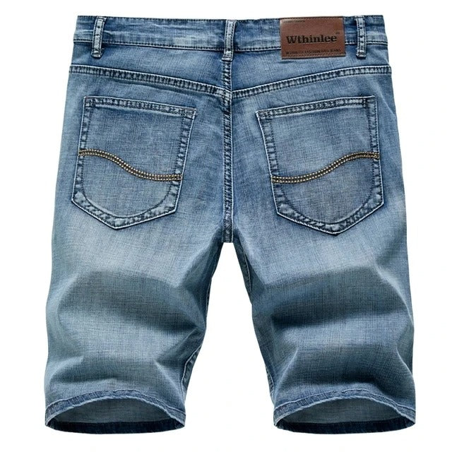 Men's classic blue denim shorts for everyday casual style. Comfortable straight leg fit & five-pocket design.