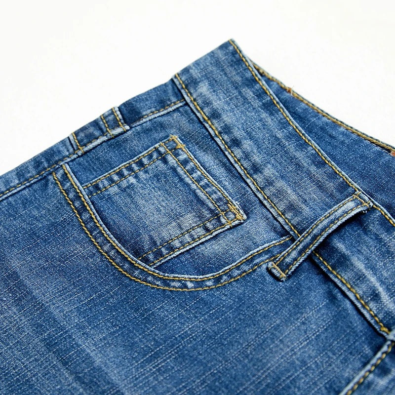 Timeless men's blue wash denim shorts. Straight leg, five-pocket, and comfortable for any casual summer occasion.