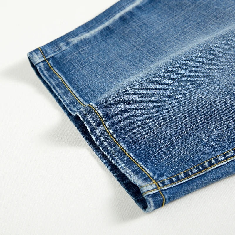 Men's classic denim shorts styled for summer activities. Comfortable straight leg fit for active casual wear.