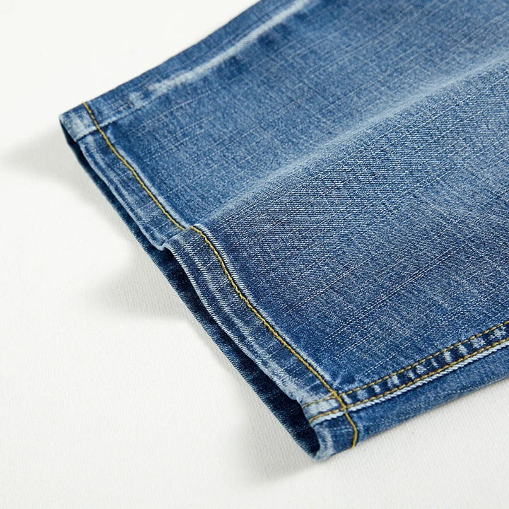 Men's classic denim shorts styled for summer activities. Comfortable straight leg fit for active casual wear.