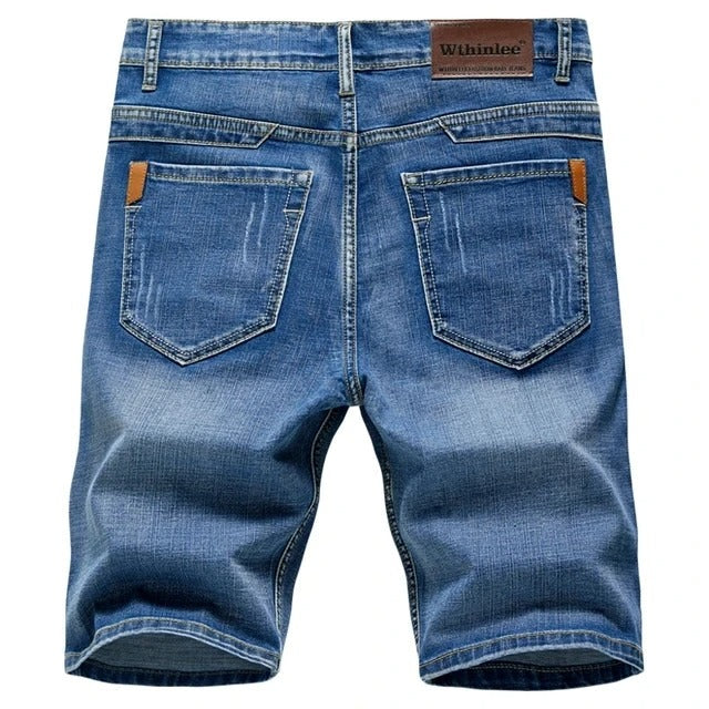 Versatile men's classic denim shorts in blue. Ideal for casual wear, featuring a straight leg cut.