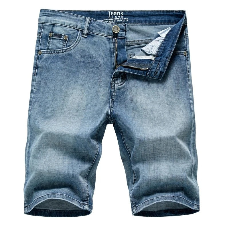 Casual men's blue denim shorts, offering a comfortable straight leg fit. Perfect for summer versatility.
