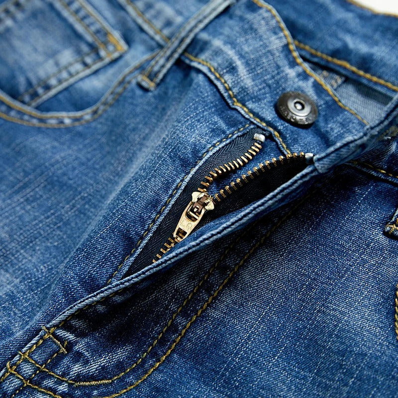 Modern classic men's straight leg denim shorts. Comfortable five-pocket design for versatile summer outfits.
