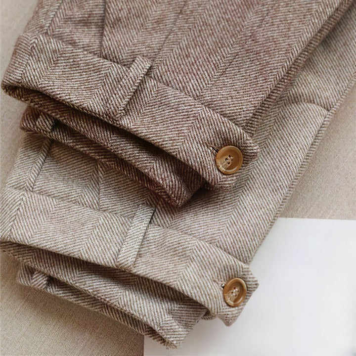 Stylish men's pleated trousers, classic herringbone design in versatile beige color