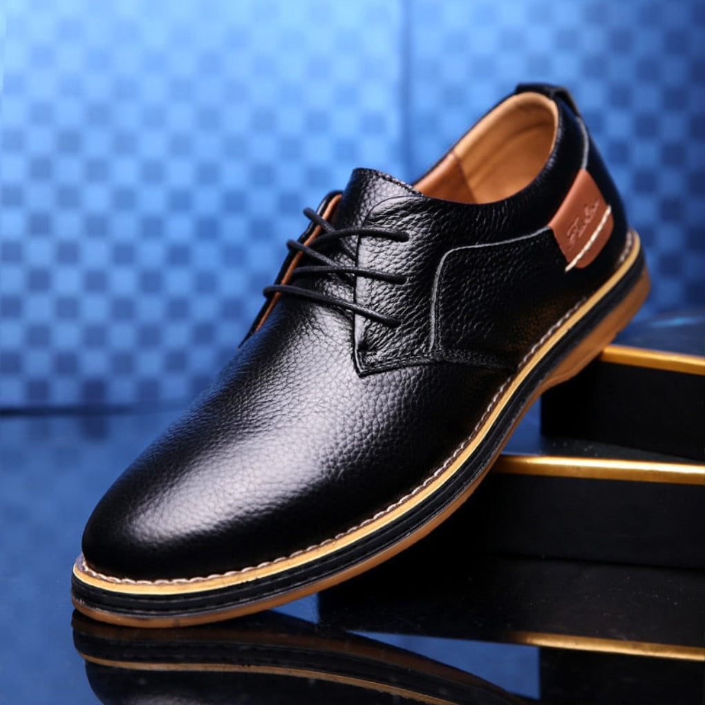 Comfortable men's Oxford dress shoes in dark brown, offering classic style, durability, and waterproof features.