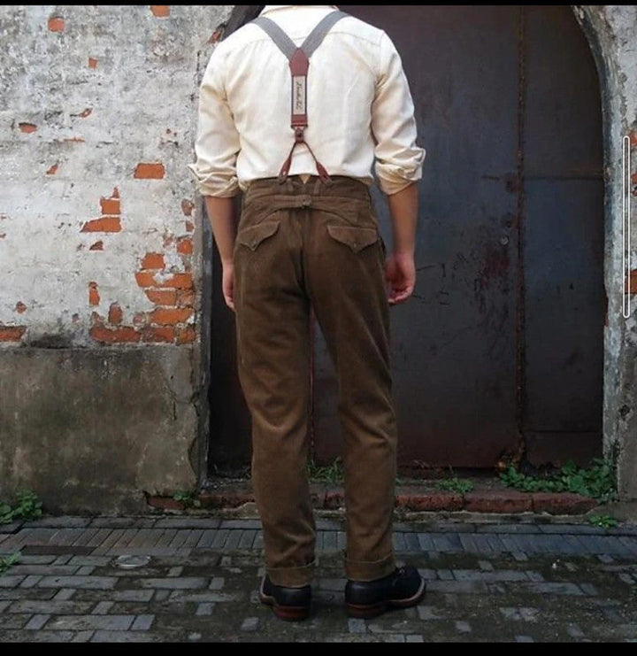 Stylish men's office wear: brown pleated trousers with suspenders. Ideal for business & formal events.