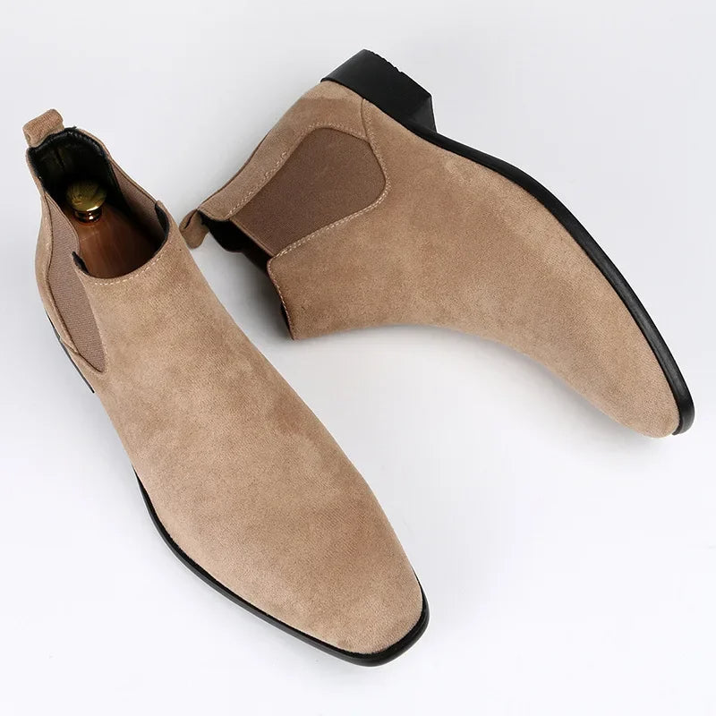 Men's suede Chelsea boots in a rich navy blue, offering comfort and style for casual outfits
