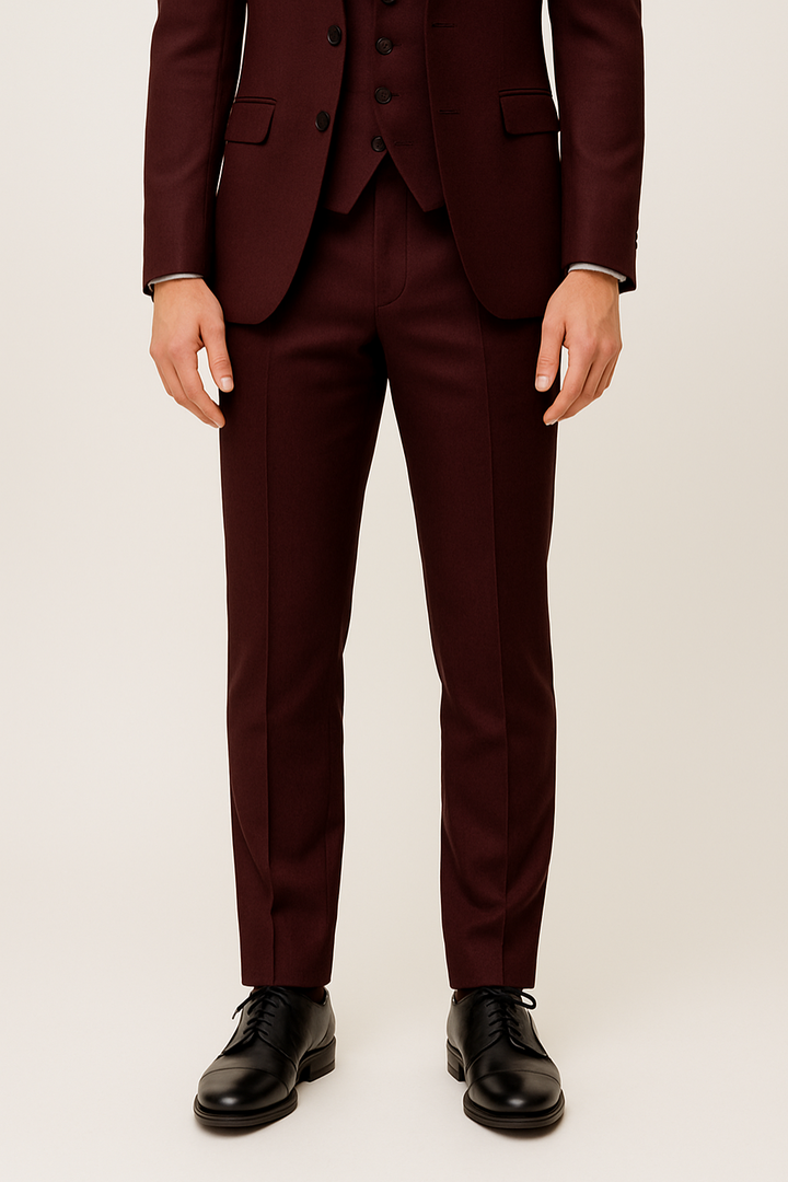 Close-up of a burgundy men's formal suit fabric, showcasing its quality and tailored design