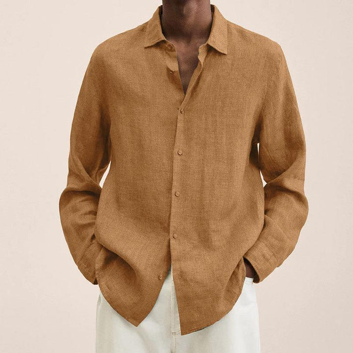 Stylish men's long sleeve button down shirt in black, ideal for both casual and semi-formal looks.