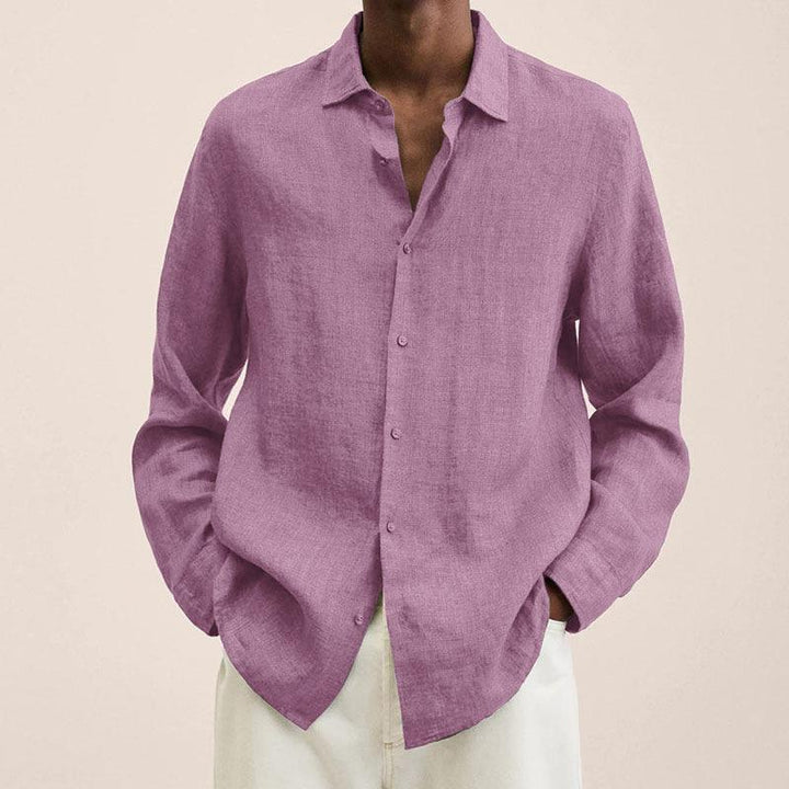 Back view of a men's breathable long sleeve button down shirt, showcasing its relaxed fit.