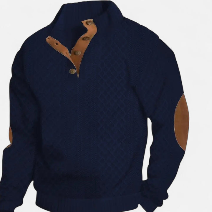 Close-up of a men's cozy cable-knit pullover sweater, showcasing the warm texture and stand collar detail.