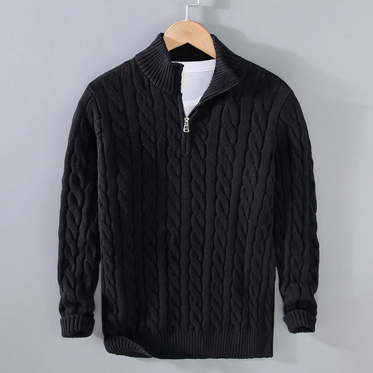 Men's classic cable knit quarter-zip sweater in a warm, textured wool blend, perfect for winter fashion.