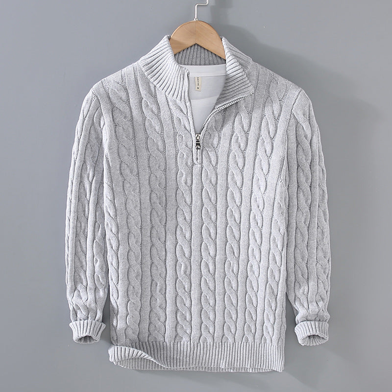 Stylish men's quarter-zip cable knit sweater, a versatile piece of casual knitwear for cold weather.